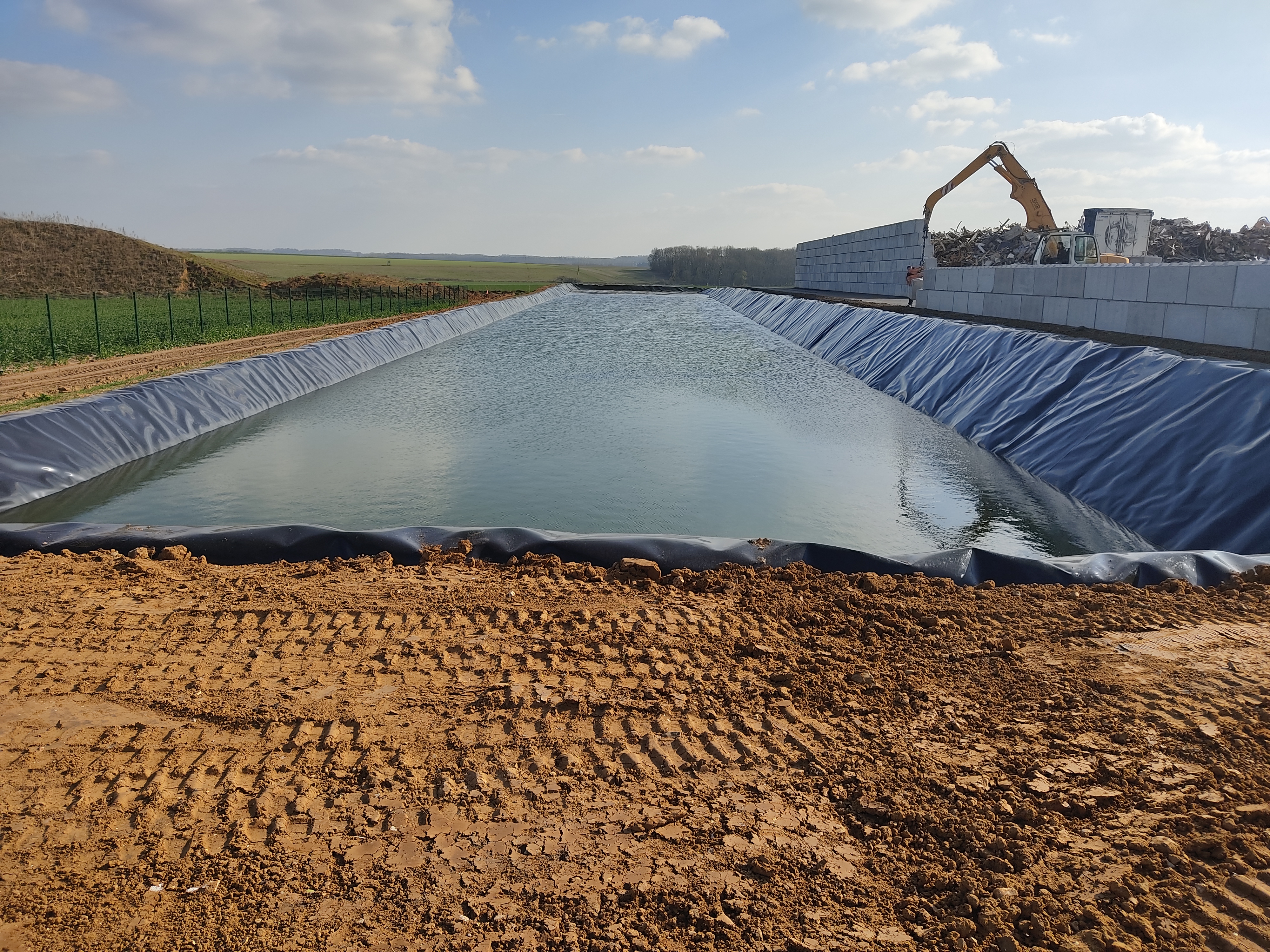 BASSIN DE RECUPERATION DES EAUX D'UNE PLATE FORME DE DECHETS   DPT60